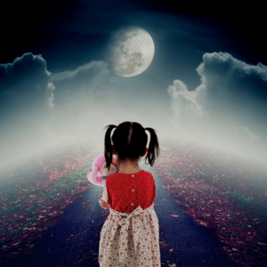 girl with ponytails looking at full moon