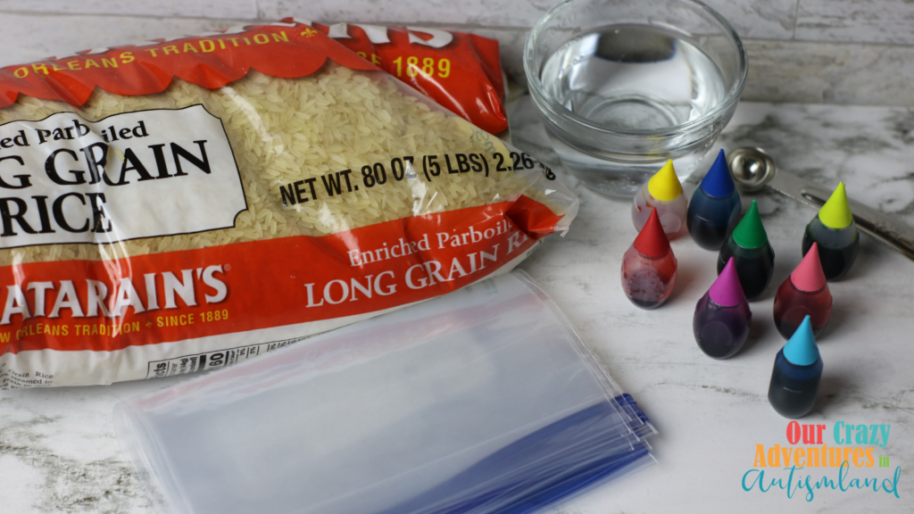 bag of rice, Ziplocs, bowl of water, bottles of food colring