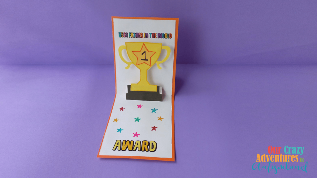 Pop up card with trophy on a purple background