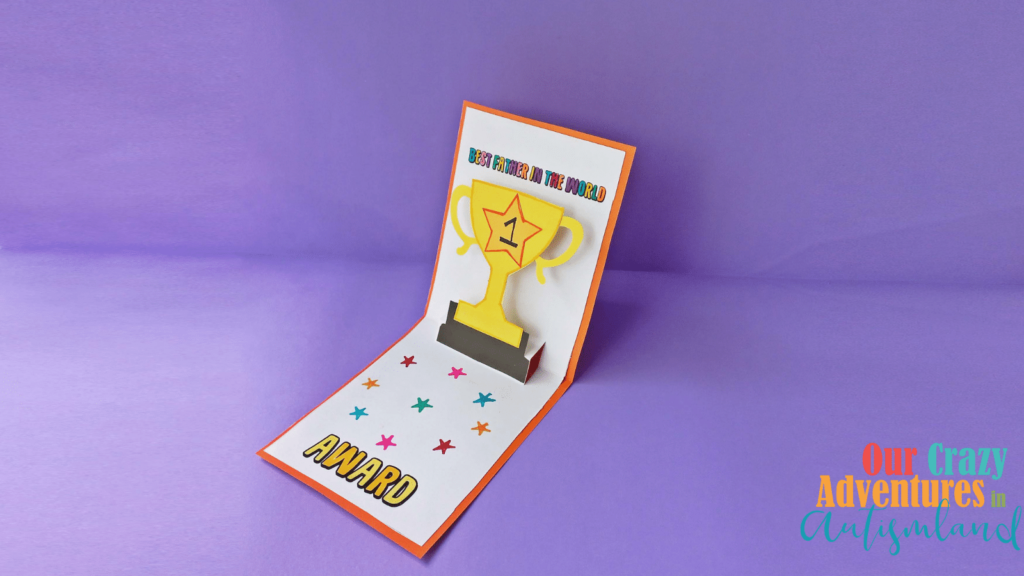 finished pop up card with trophy on purple background
